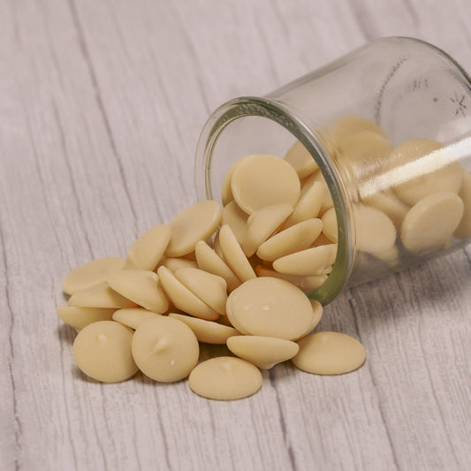 bit-sized white chocolate discs in half pound bags