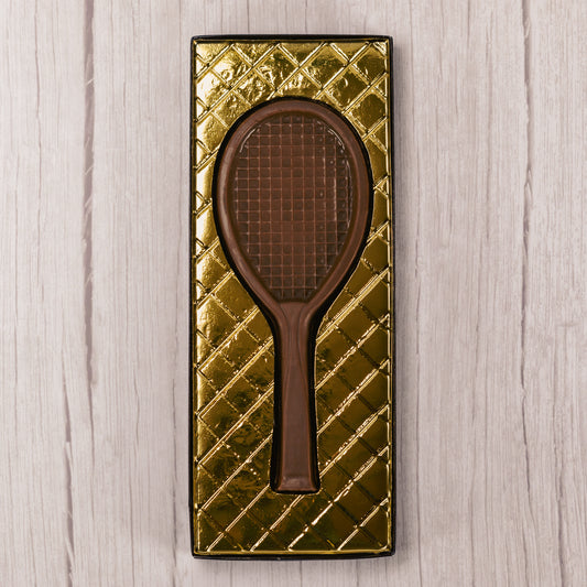 milk chocolate tennis racquet in a box.