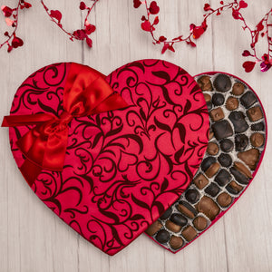 a three pound box of assorted milk and dark chocolates in a beautiful red velvet heart box.