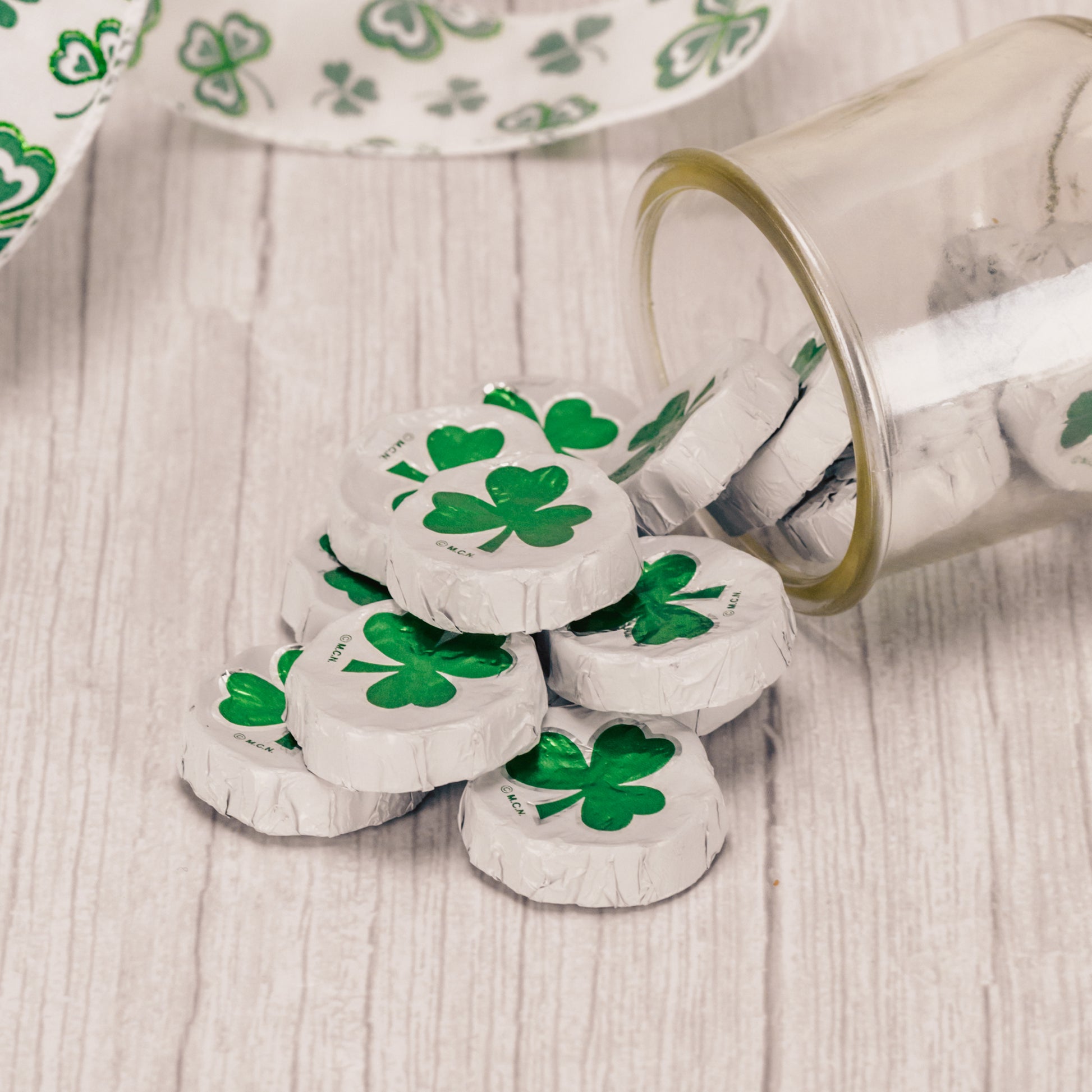 a half pound bag of milk chocolates wrapped in shamrock foil.