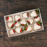 a half pound box of white coating (tastes like white chocolate) covered strawberries