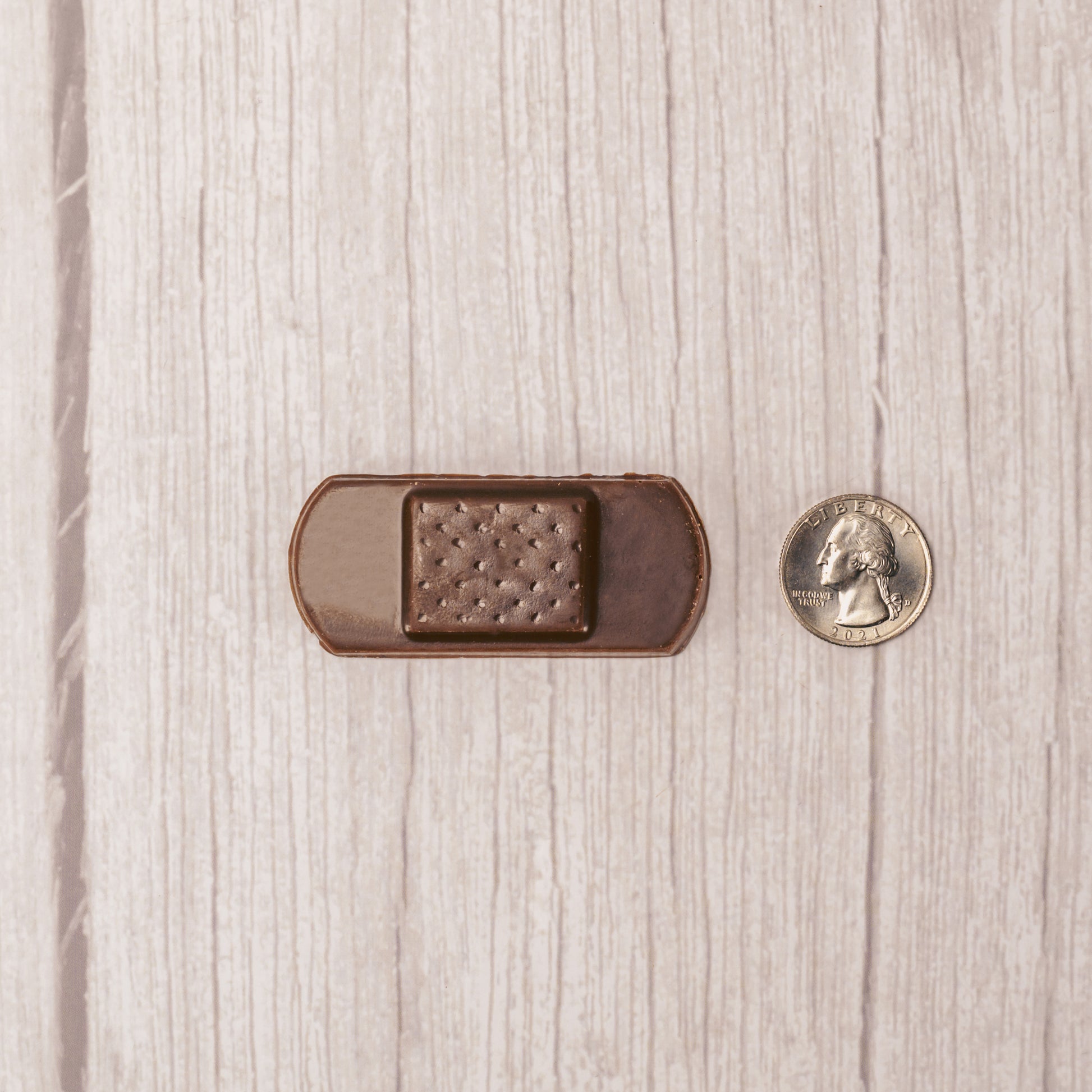 Milk chocolate in the shape of a bandage.