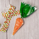 choose between Reese's Pieces or Jelly Belly Orange, Tangerine or Orange Sherbet jelly beans placed in a plastic bag to look like a carrot.