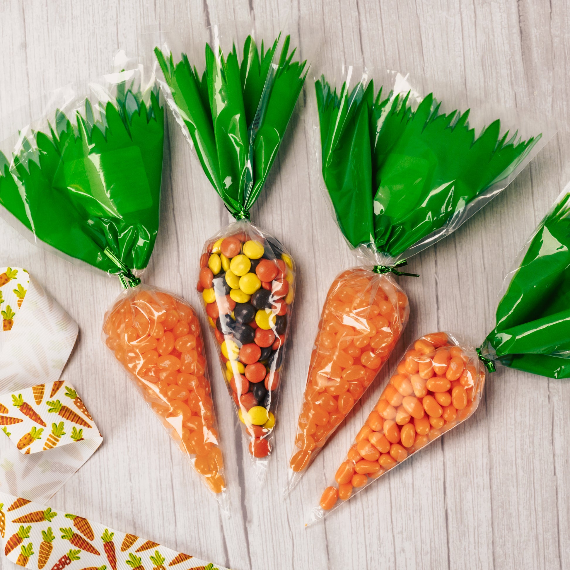 choose between Reese's Pieces or Jelly Belly Orange, Tangerine or Orange Sherbet jelly beans placed in a plastic bag to look like a carrot.