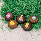 An oreo cookie covered in milk or dark chocolate with a sugar Easter decoration on top. Individually packaged. 