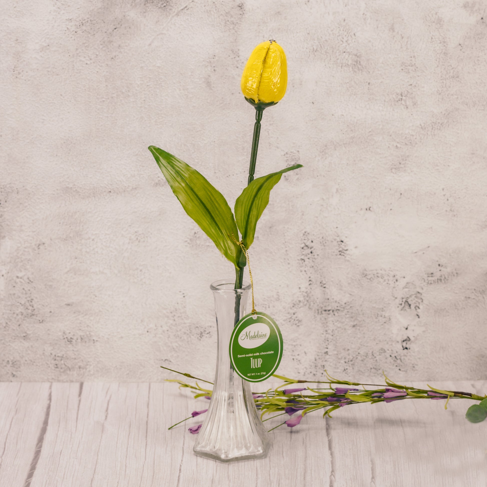 Milk chocolate covered in bright foil to resemble a tulip. Assorted colors of foil.
