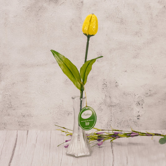 Milk chocolate covered in bright foil to resemble a tulip. Assorted colors of foil.