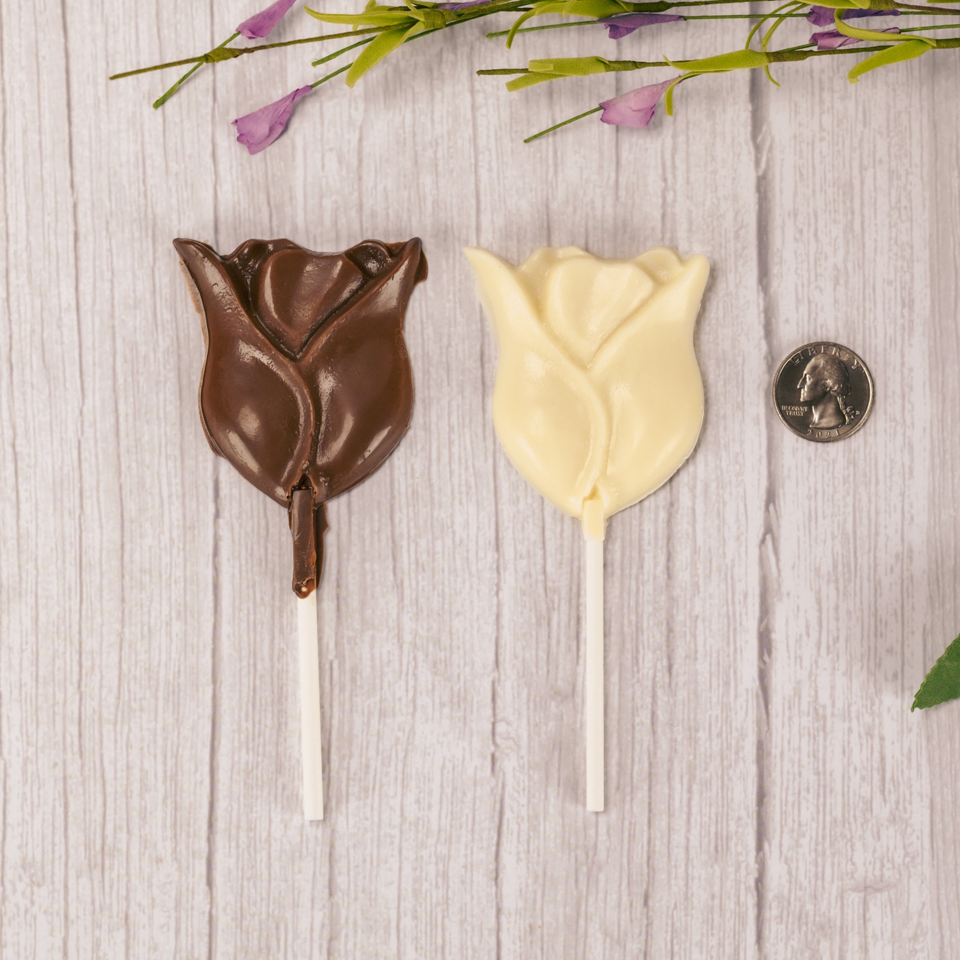 Milk chocolate and white coating (like white chocolate) tulip suckers.