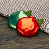 Milk chocolate wrapped in red or green foil to look like an apple.