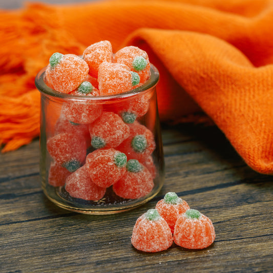 Sugar coated orange gummi pumpkins with sour orange flavor