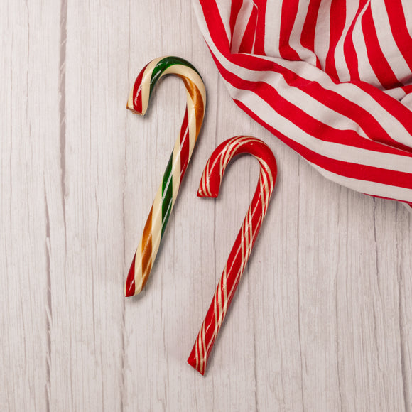 large filled candy canes are flavored peppermint with chocolate filling and sugar cookie with white icing.