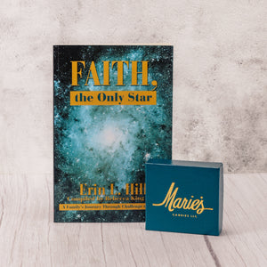a sampler box of assorted chocolates (7 piece assortment) is paired with the book about Marie starting her business, "Faith, the Only Star"
