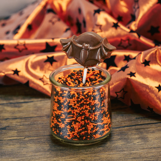 Milk chocolate molded bat on a sucker stick.