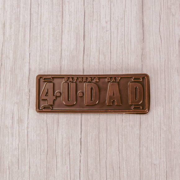 a flat rectangle that reads 4 U DAD in milk chocolate. Approximately 5.5 inches tall by 2 inches wide
