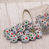 bite size milk chocolate balls wrapped in soccer ball foil in a half pound bag.