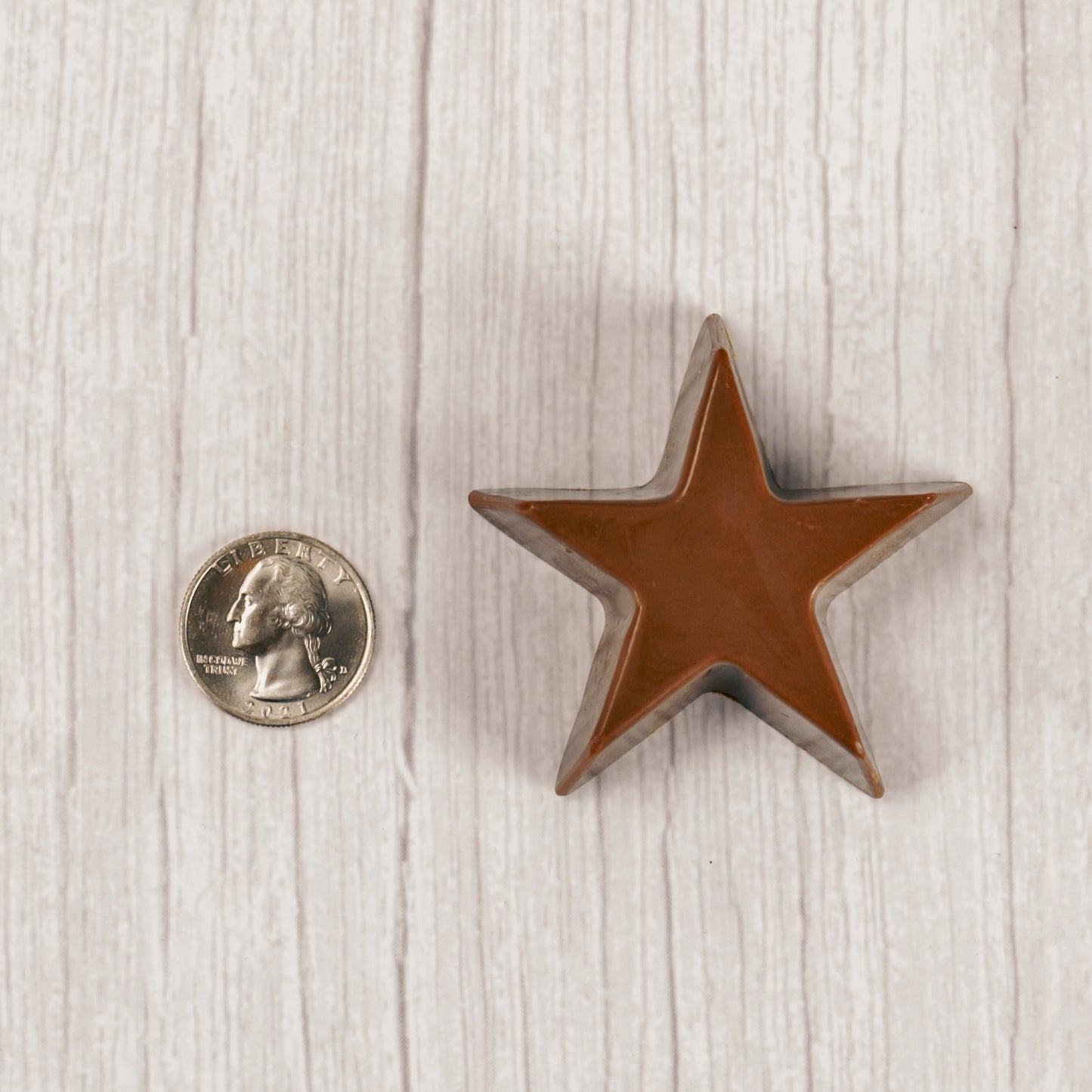 Milk chocolate star mold. Individually wrapped.