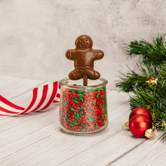Milk chocolate gingerbread man on a sucker stick