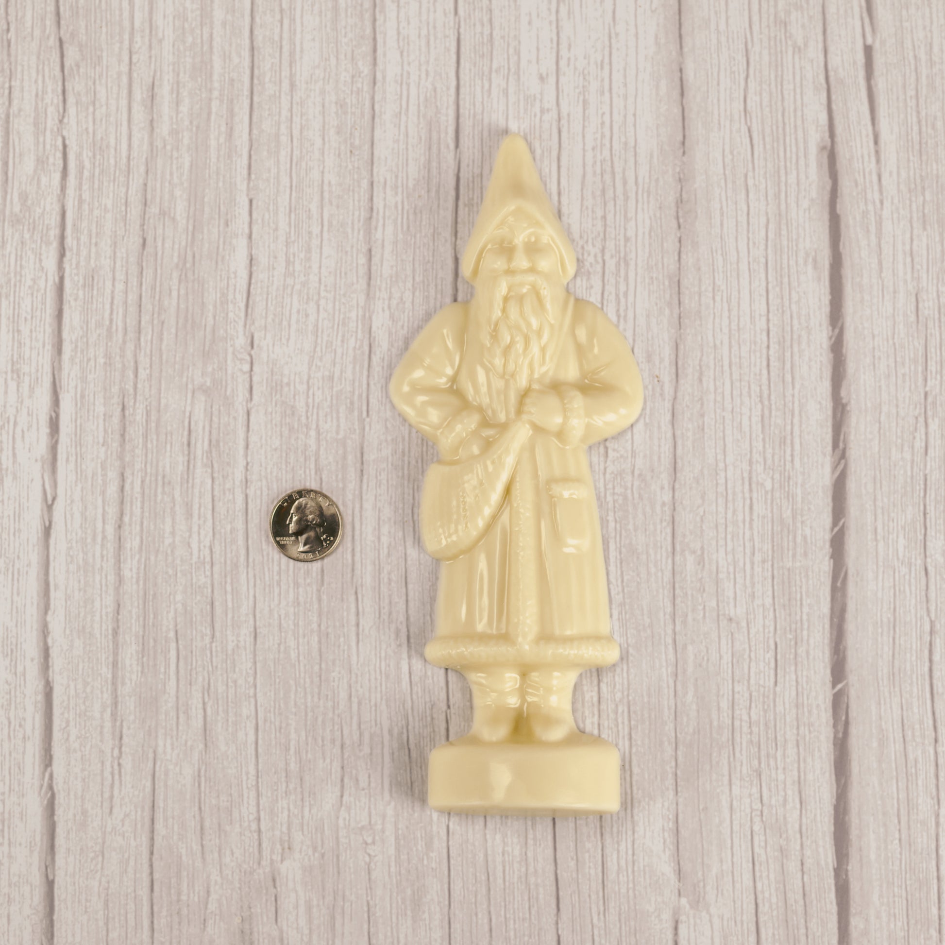 a tall St. Nick in white coating.