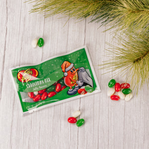 Red, green and red jelly belly beans in a long clear sleeve. Red apple, green apple, coconut and cherry flavors.