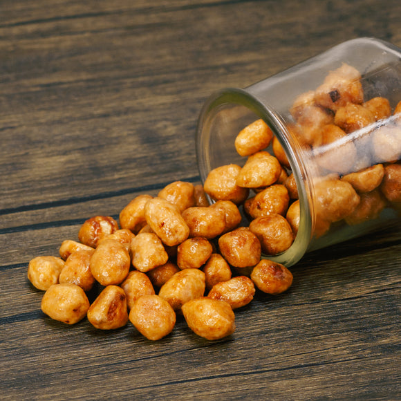 peanuts covered in a butter and sugar coating in a half pound bag.