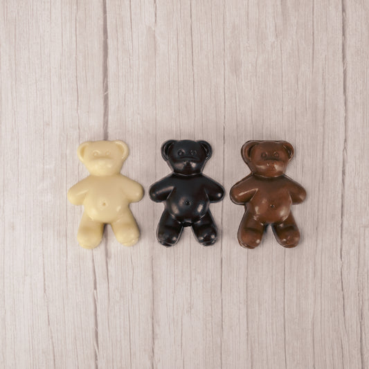 Solid milk chocolate, dark chocolate, and white coating teddy bears.