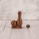 Sold milk chocolate in the shape of a bowling ball and pin.