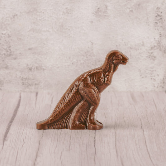 a standing milk chocolate dinosaur
