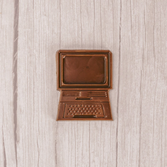 a flat computer mold in milk chocolate.