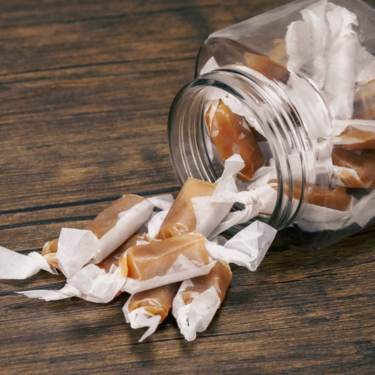 butterscotch caramels wrapped in wax paper. half pound bags.