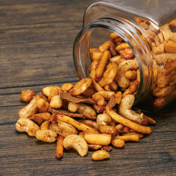 a pound of spicy cajun blend of peanuts, cashews, pretzels, chili-lemon corn sticks, breadsticks, and rye chips