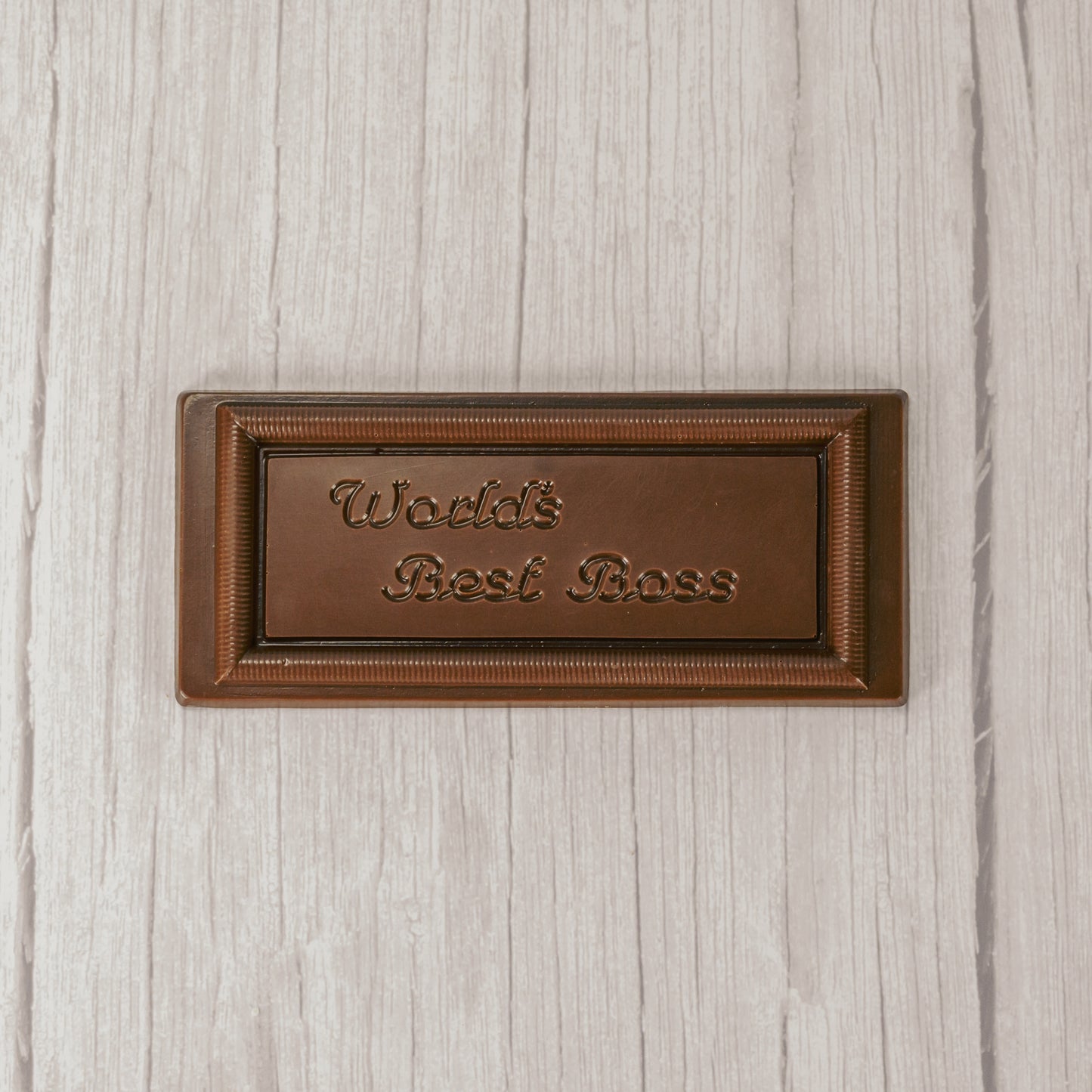 sold milk chocolate rectangle bar that reads "World's Best Boss"