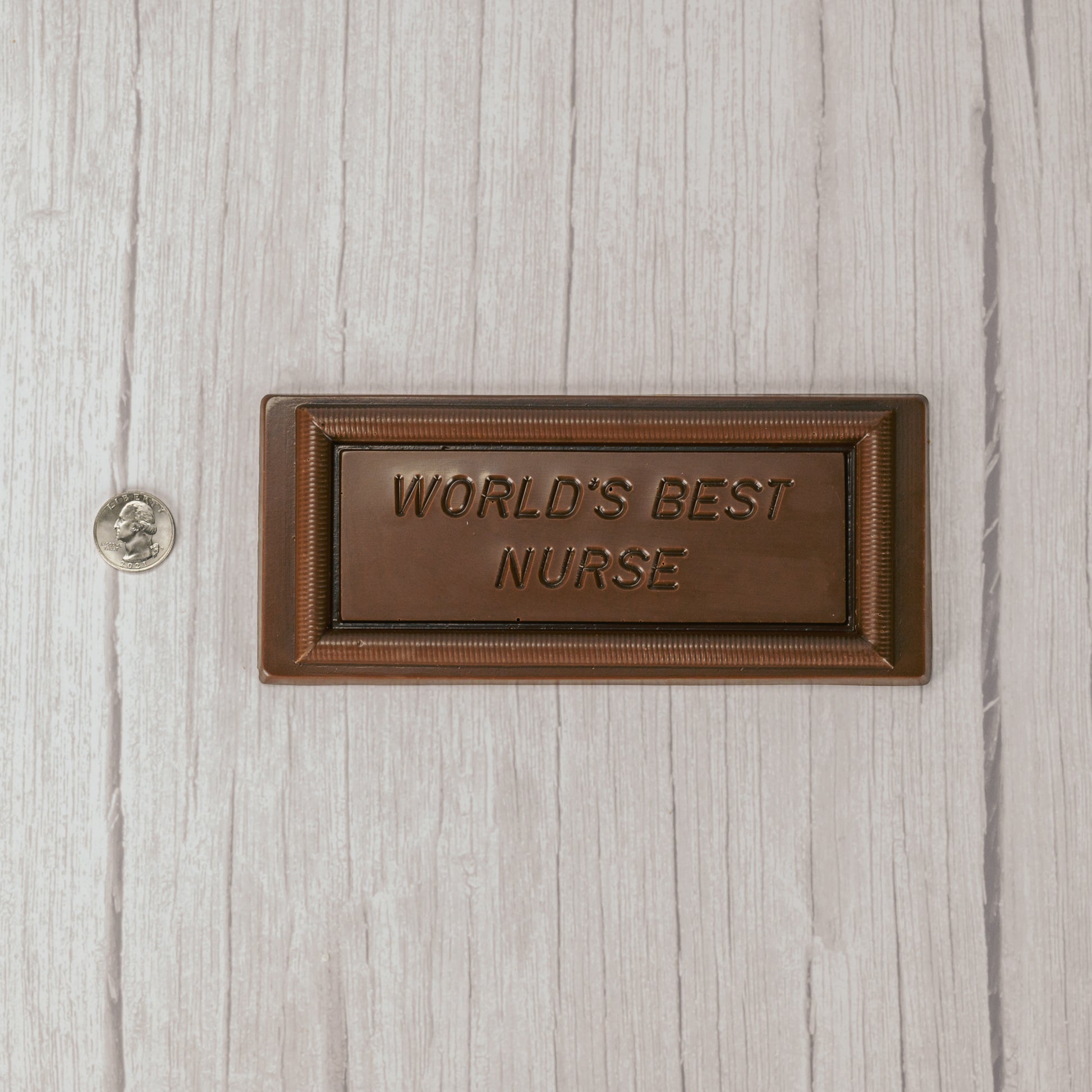 solid milk chocolate rectangle bar that reads "World's Best Nurse"