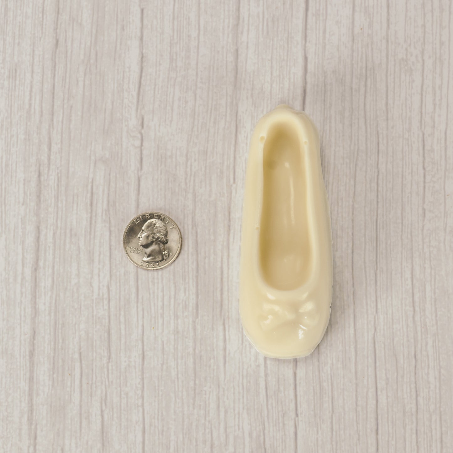 a ballet slipper in milk chocolate or white coating. Individually wrapped.