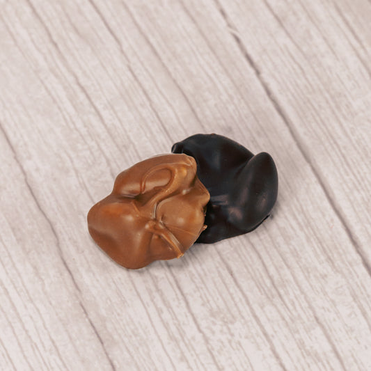 Cluster of almonds dipped in smooth milk chocolate or rich dark chocolate.