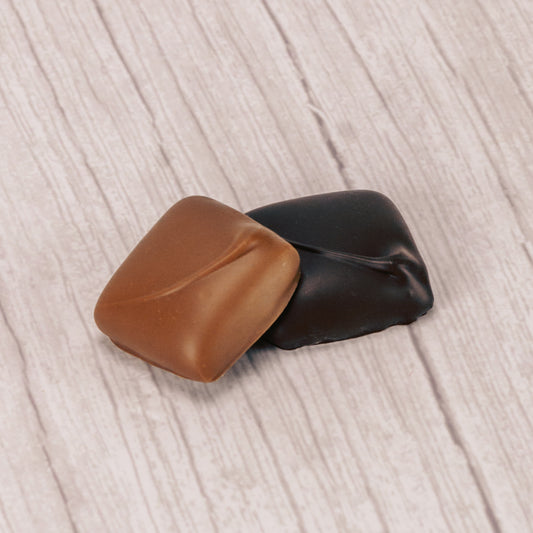 Half pound box of milk chocolate or dark chocolate butter crunch, like toffee.