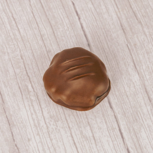 Crushed potato chip pieces with caramel covered in smooth milk chocolate. Sweet and salty combination in a pound box.