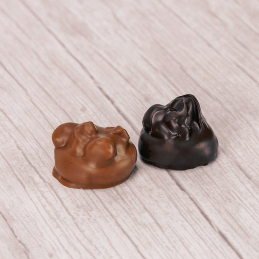 Vanilla cream topped with peanuts and covered in rich dark chocolate or sweet milk chocolate. Approximately 32 pieces in a  One pound box.