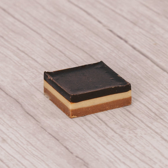 smooth milk chocolate, smooth peanut butter and rich dark chocolate layered into bite-sized squares and packaged in half pound clear rectangle tubes