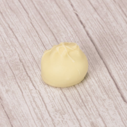 lime flavored cream center covered in white coating in a pound box. Available during the summer