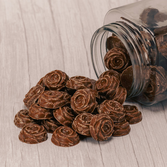 Solid milk chocolate pieces that look like roses and are bite-sized. One pound bag