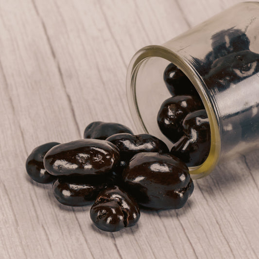 dark chocolate covered pecans with a slight amaretto flavor. In half pound bags