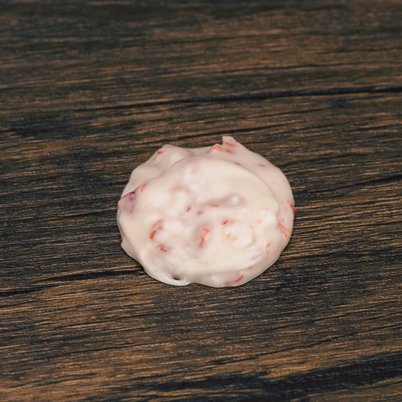 white coating with candy cane peppermint grind. One pound box.