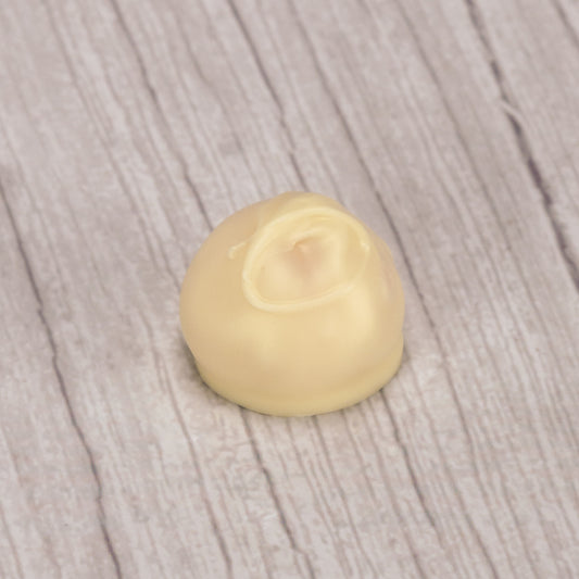 A luscious tangy orange cream center dipped in sweet white coating - a treat only available during the summer.