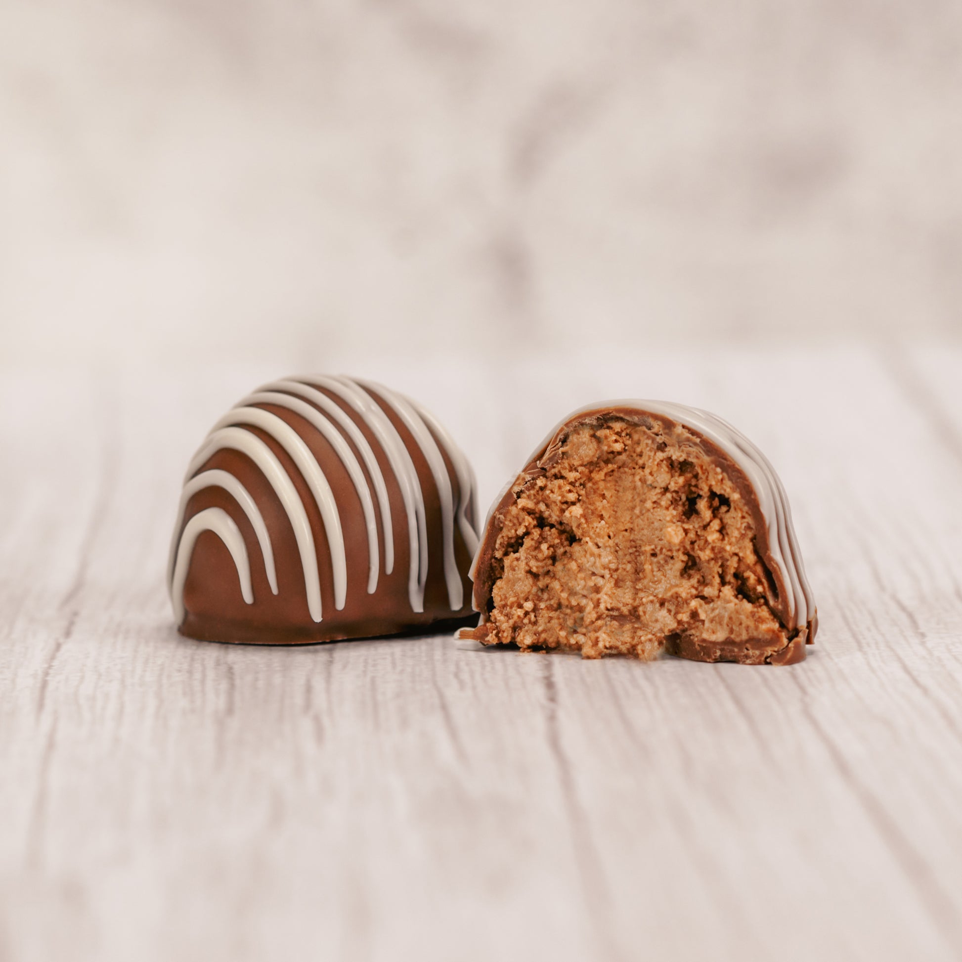  Marie's Truffles made only five times during the year for special occasions. Available in three flavors.