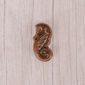 a small milk chocolate seahorse. Individually packaged.