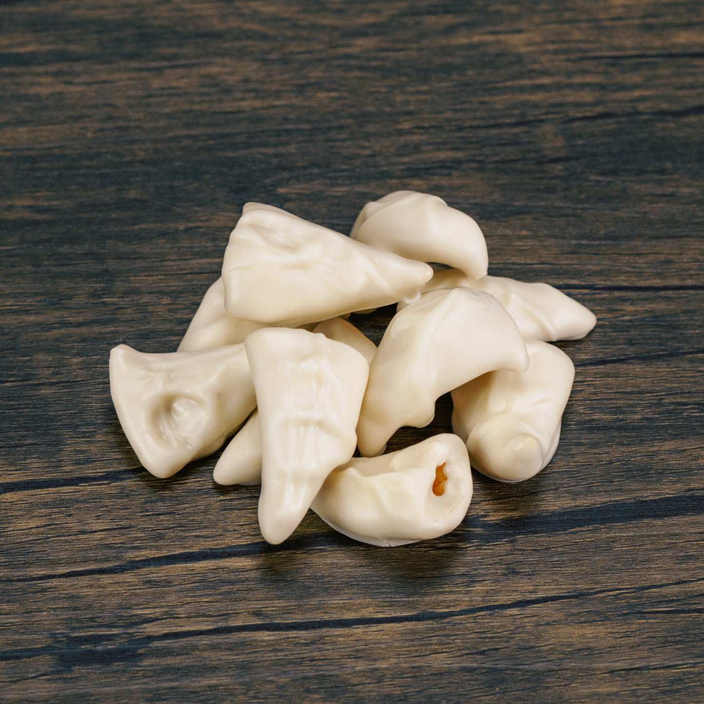 Bugle corn chips dipped in white coating in a half pound box. Sweet and salty combination