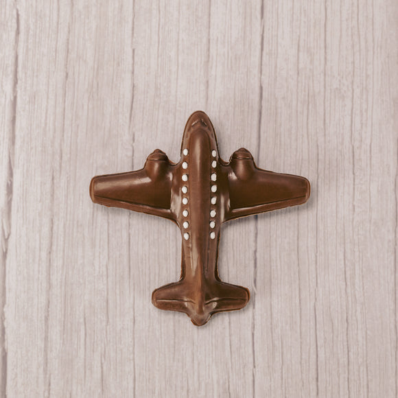 solid 2 oz. milk chocolate airplane with white windows (made from icing)
