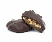 freshly roasted pecans and caramel covered in dark chocolate. Like a traditional "Turtle" 