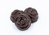 dark chocolate molded into bite-sized rosebuds