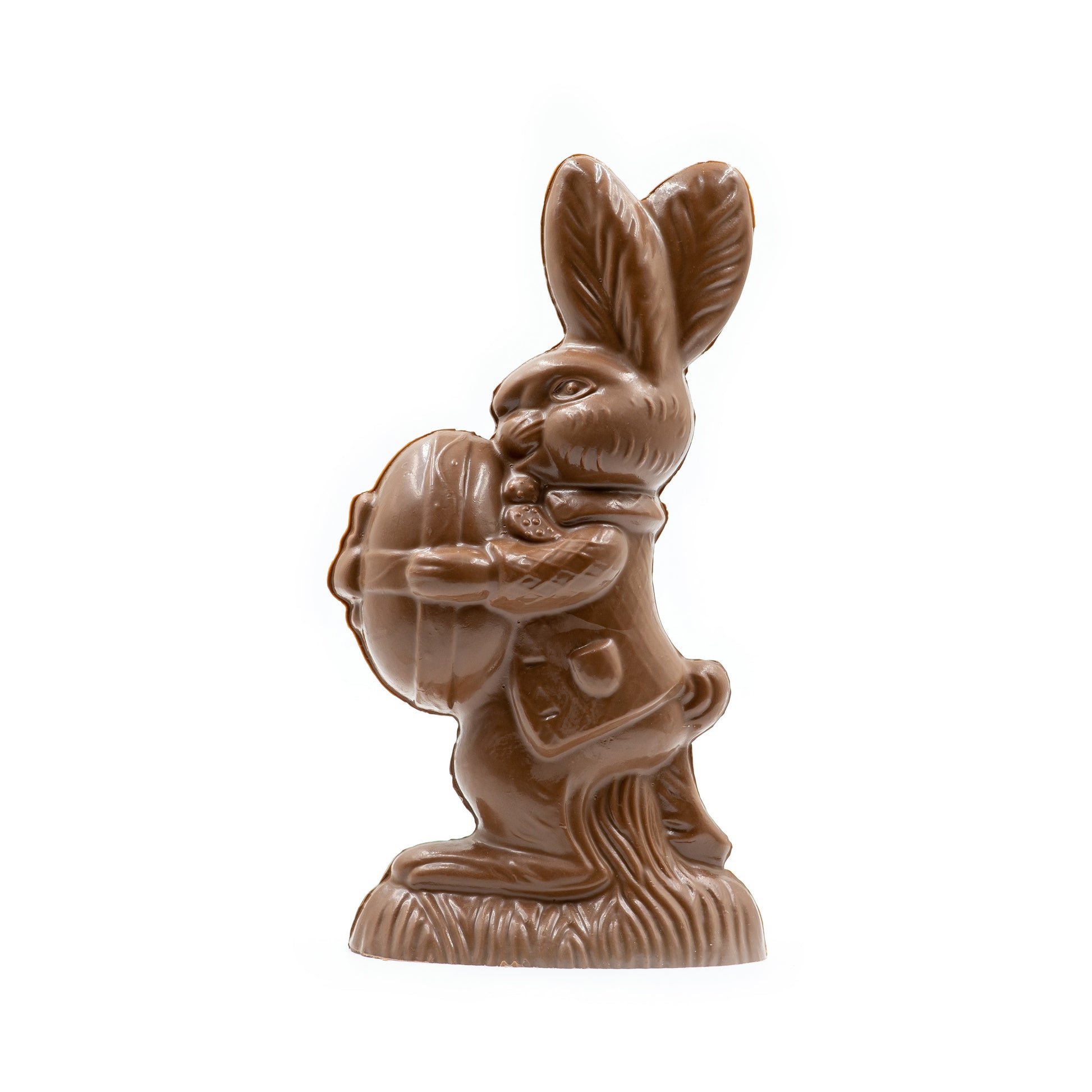 Almost three pound of milk chocolate, Hopkin's the Butler is holding a large egg in front of him.